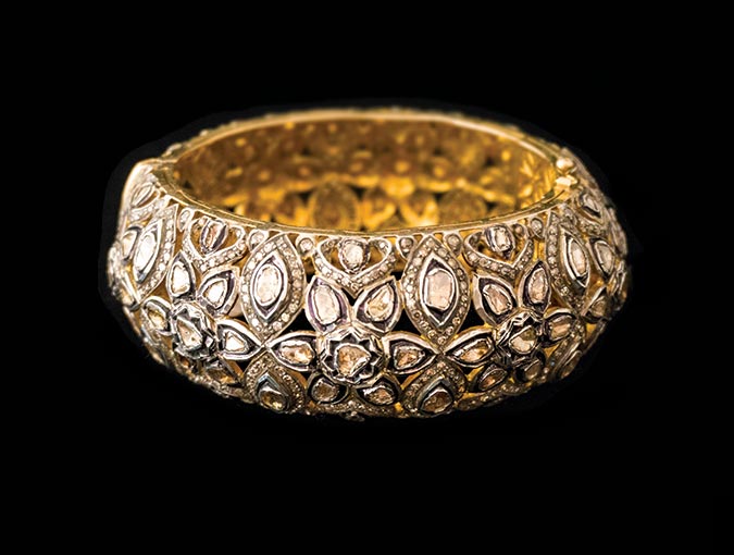 Buy or consign fine jewelry. See this 14k sterling and rose-cut diamond bangle bracelet at our La Jolla store.
