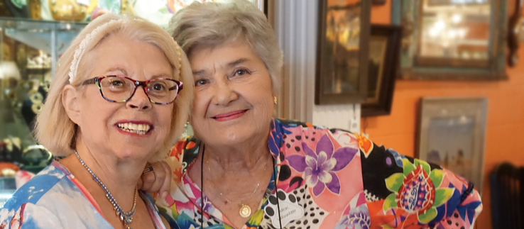 Image of two happy volunteers at The Ark.