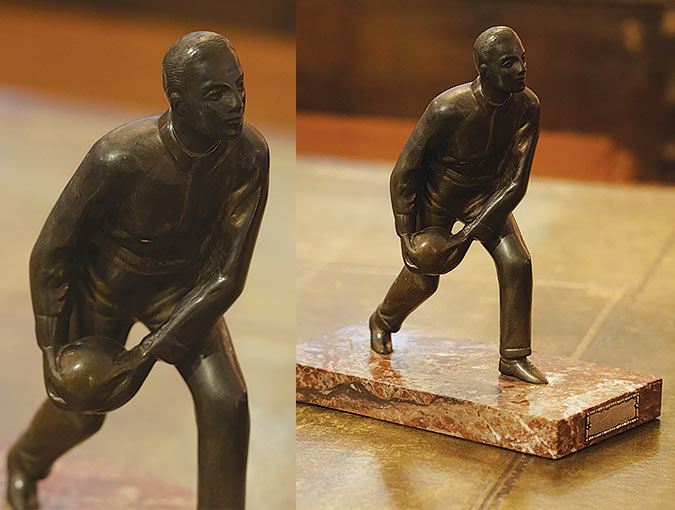 Image Of Cold-Painted Bronze Sculpture Of Male Bowler $195 On Red Marble Base With Inscription, “d.s.k. Of 1940, 1889-1949” 7”W X 4”D X 8”H.