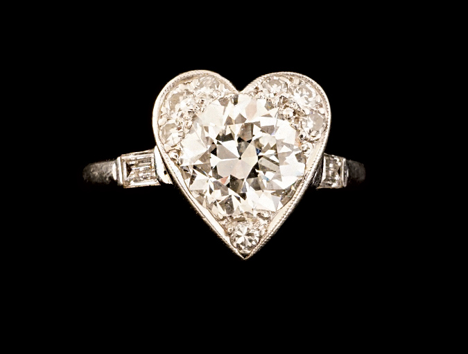 Image Of Vintage Platinum And Diamond Ring: Round Diamond Surrounded By Pave Diamonds Set In Heart-shaped Bezel.